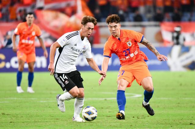 开云体育-软肋太明显！泰山被横滨反击抢走3分 前景不乐观